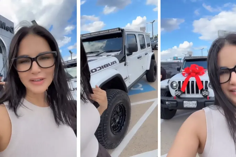 Sunny Leone posing with her new white Jeep Wrangler Rubicon SUV in the US