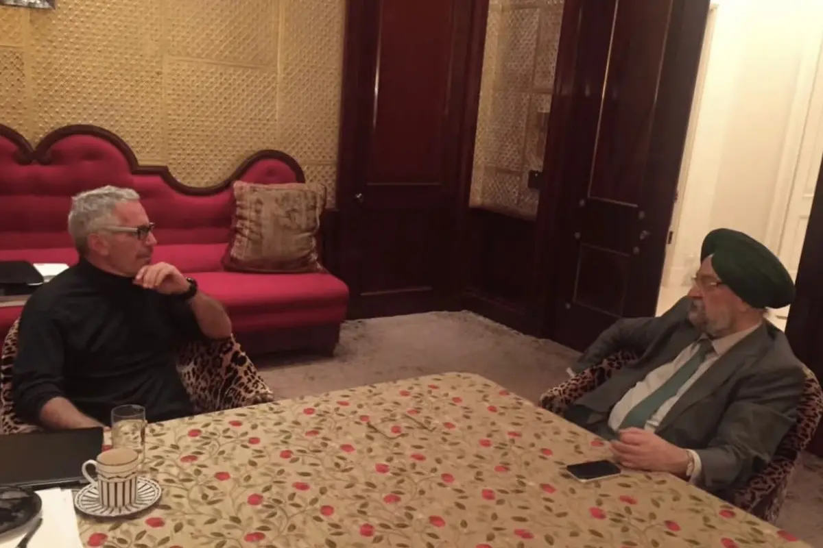 A photo of Union Minister Hardeep Singh Puri with Jeffrey Epstein | Photo: Sanjay Raut (@rautsanjay61 on X)
