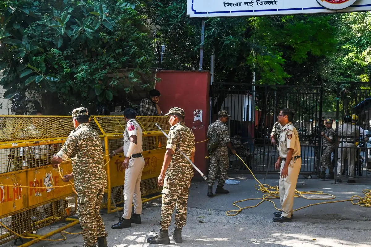 Security personnel present outside the Mandir Marg Police Station