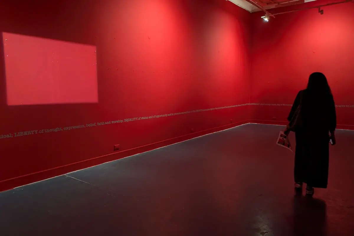 A visitor looks at the empty wall at Raihan Vadra's exhibition, at Bikaner House in New Delhi, Wednesday, Oct. 21, 2026 (Photo: PTI)