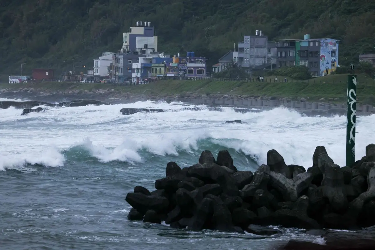 Waves crash along the coast as Typhoon Champi approaches Taiwan in Keelung on October 22, 2026.