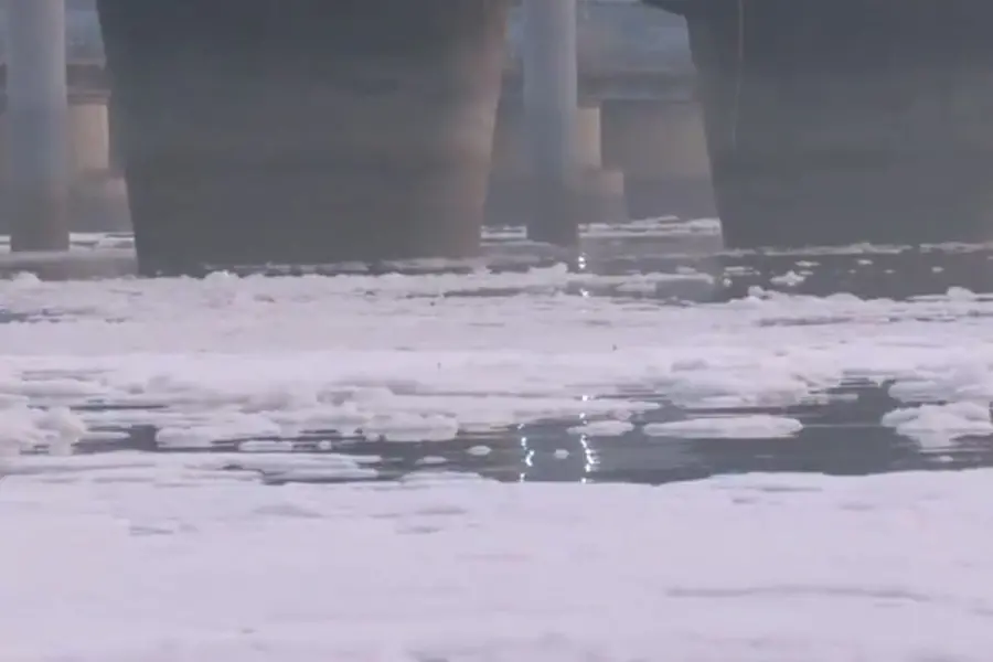 Toxic foam seen floating on the surface of the Yamuna River in Kalindi Kunj