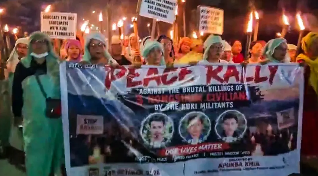Meira Paibi activists, Laipham Khunou, Sangakpham, Chingmeirong and Kontha Ahallup Meira Paibi groups jointly carried out a massive torch rally, condemning the killings of three civilians in the recent violence at Sunulok Hill, in Imphal.| Photo: PTI