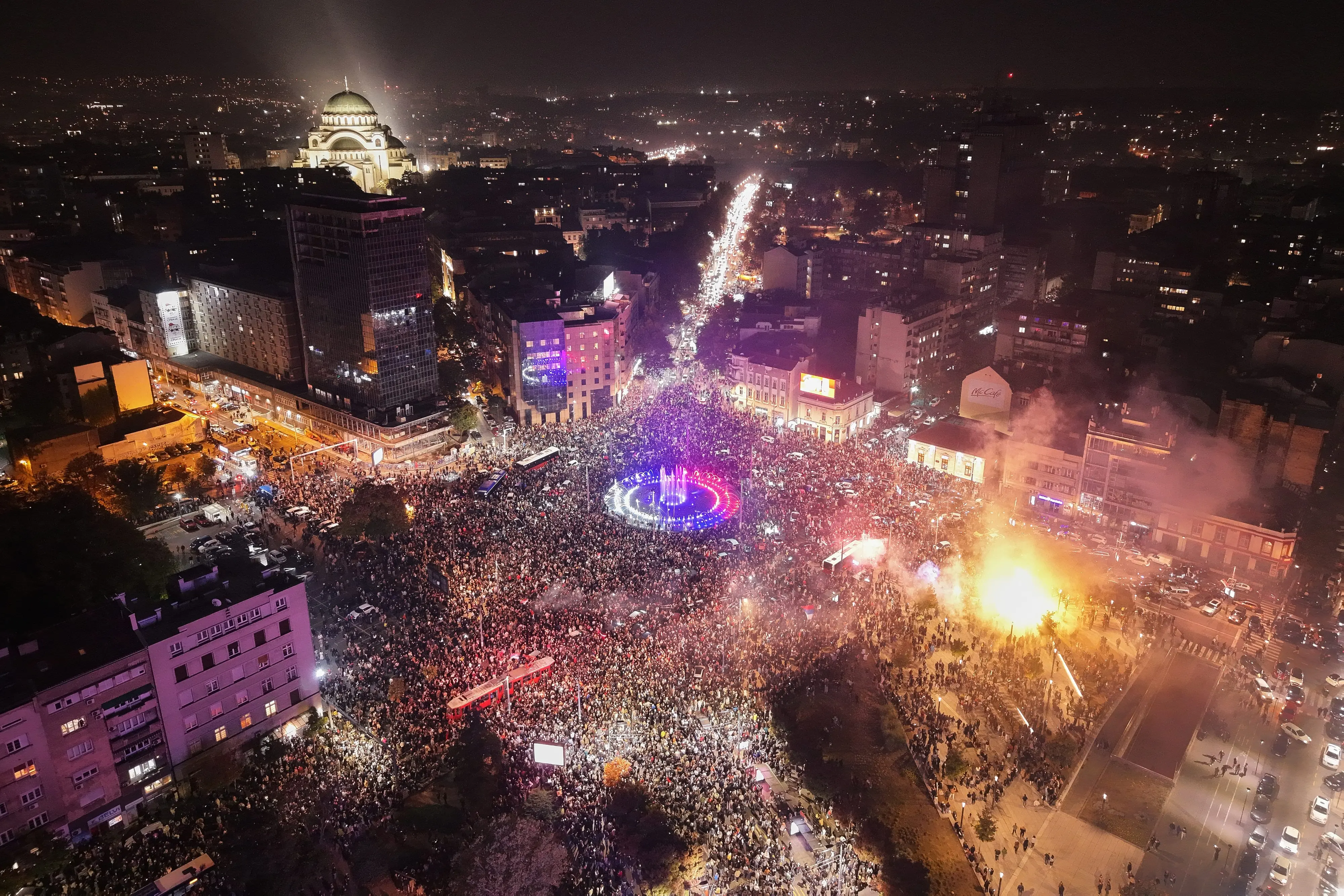 People celebrate after Aleksandar Vucic, leader of the right-wing Serbian Progressive Party (SNS) conceded defeat in the parliamentary election in Belgrade | PTI