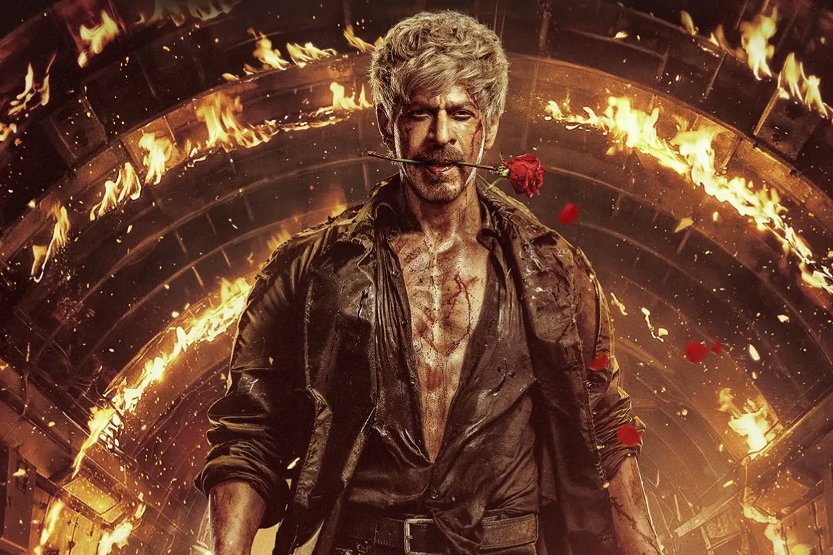 Shah Rukh Khan unveils a new poster of 'King' with a rose between his lips. Photo | Instagram/@shahrukhkhan