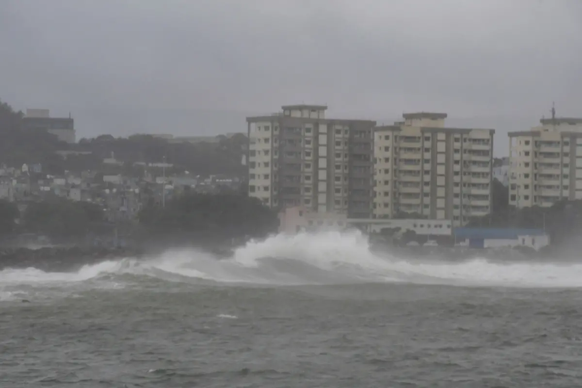 High tidal waves hit the coast under overcast skies, in Visakhapatnam, Andhra Pradesh | Photo: PTI