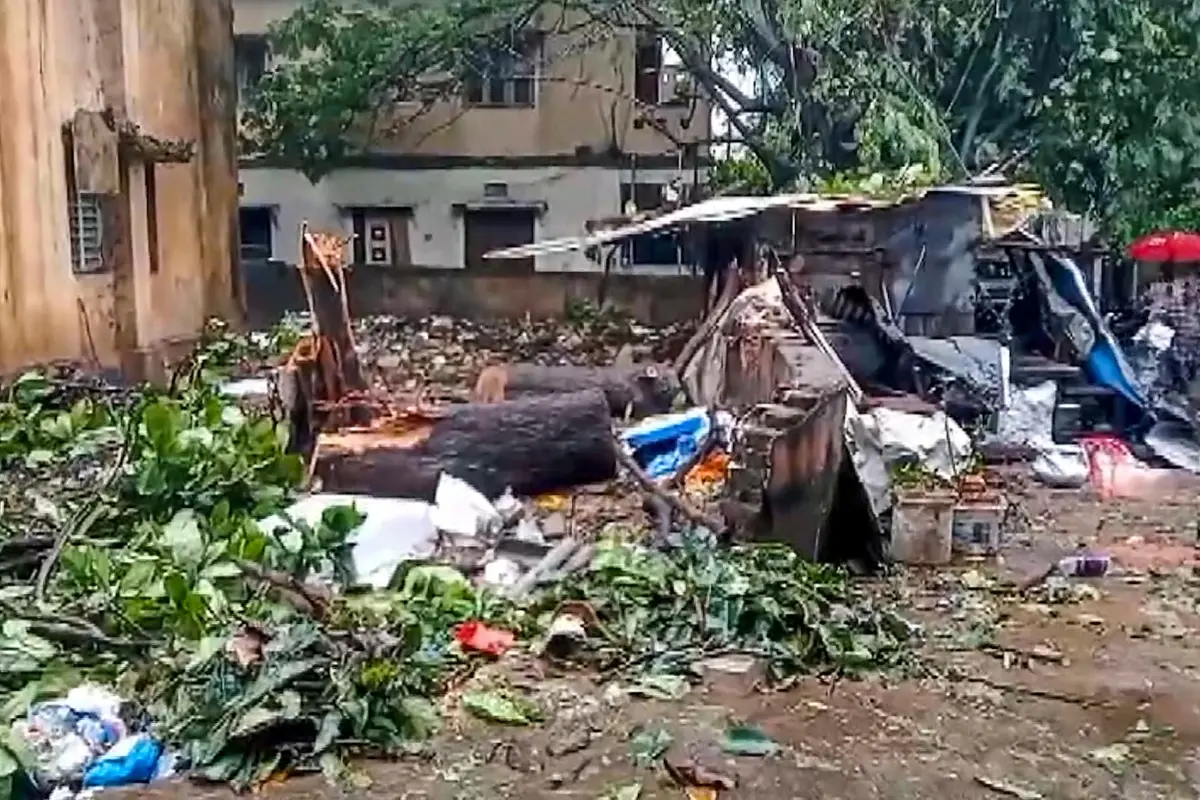 Uprooted trees and damaged structures lie scattered following heavy rainfall and strong winds triggered by Cyclone 'Arnab ' in Visakhapatnam on Wednesday, Oct. 28, 2026. (PTI Photo)