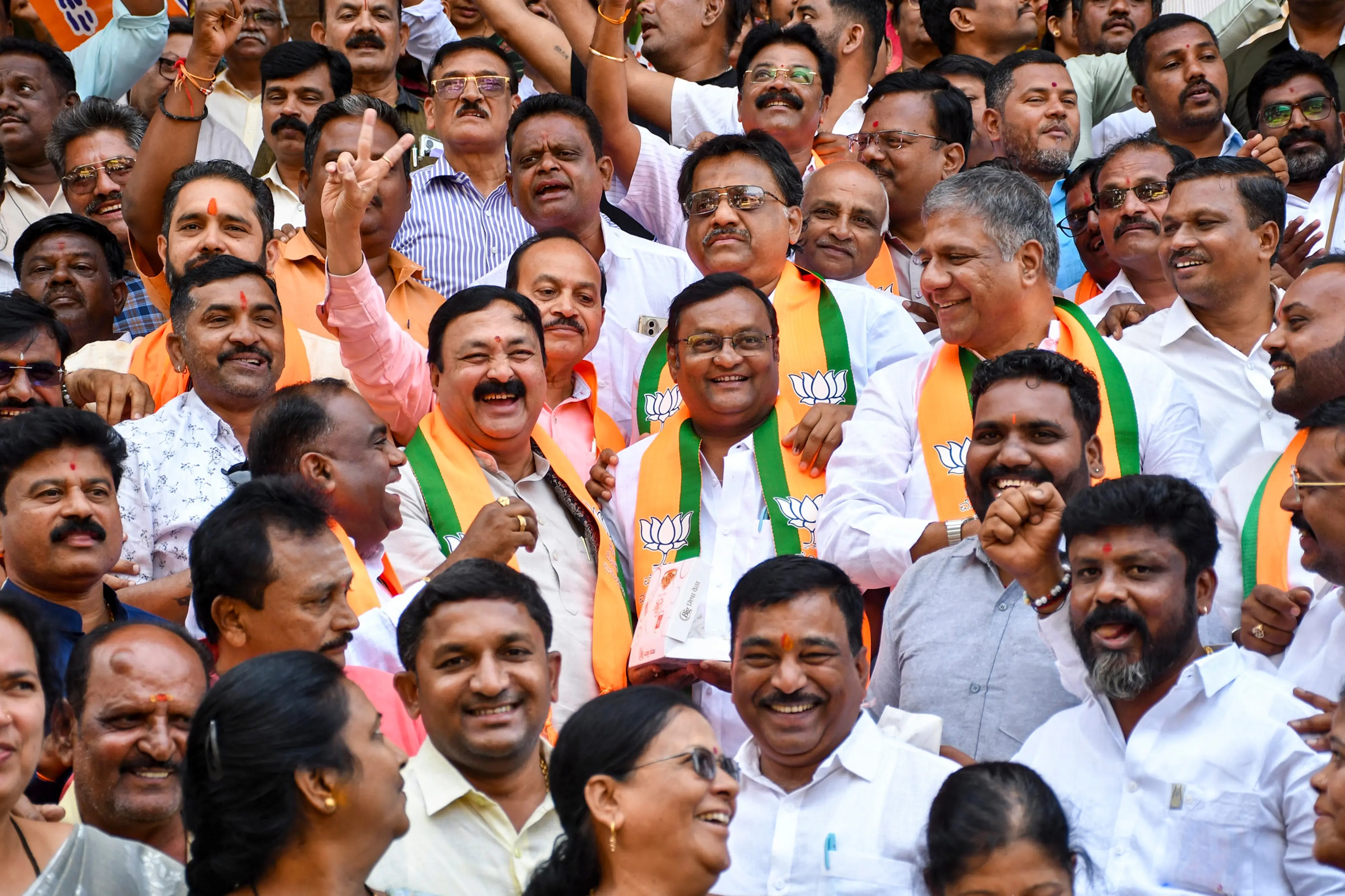 BJP leaders celebrate after winning four seats in the Karnataka Legislative Council (MLC) polls, in Hubballi, on Wednesday, Oct 28, 2026 | Photo: PTI