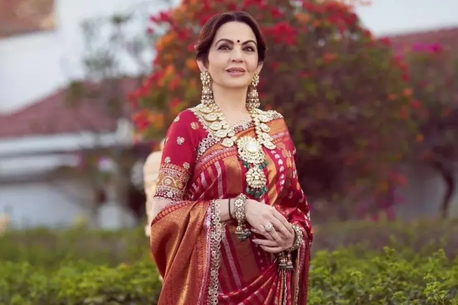 Nita Ambani turns heads in vermilion Banarasi saree and heritage jewellery at Reliance Diwali party